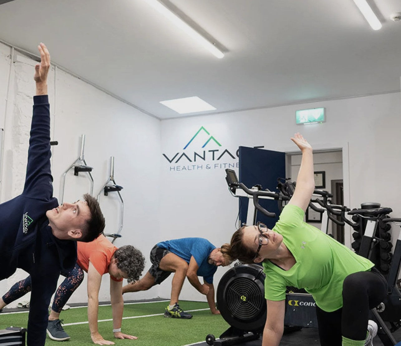 A Vantage coach leading a mixed-age mobility class in the Marino studio